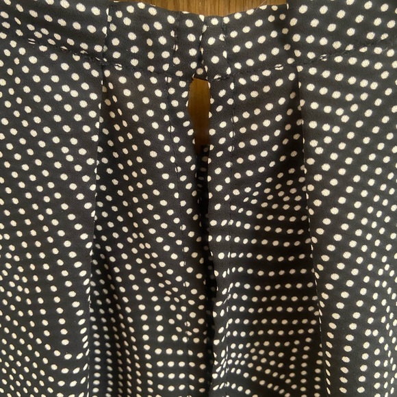 Ann Taylor sleeveless blouse. Button closure at neckline. - Picture 4 of 5